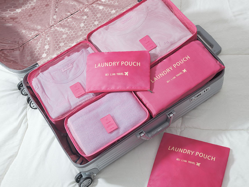 Set of six dealonlinenz travel storage bags for clothes, luggage packing cube organizers for easy suitcase organization.