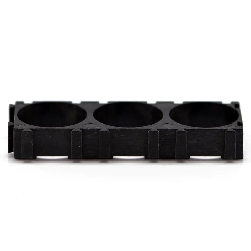 18650 spacer for three batteries, compatible with rechargeable lithium-ion cells, used in electronic devices and flashlights.