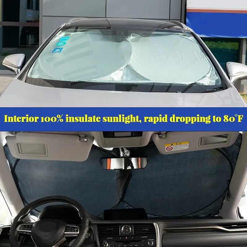 Large silver foldable car sunshade with double-circle design from dealonline.co.nz, showing the sunshade unfolded inside a vehicle.