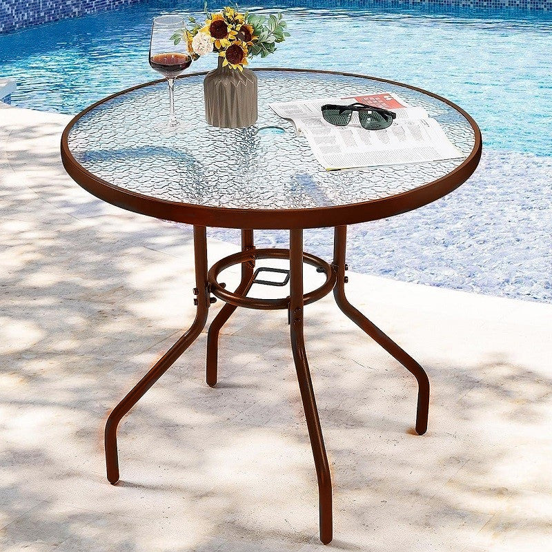 Brown 80cm tempered glass round garden table with sturdy metal frame, perfect for outdoor patio or garden setting.