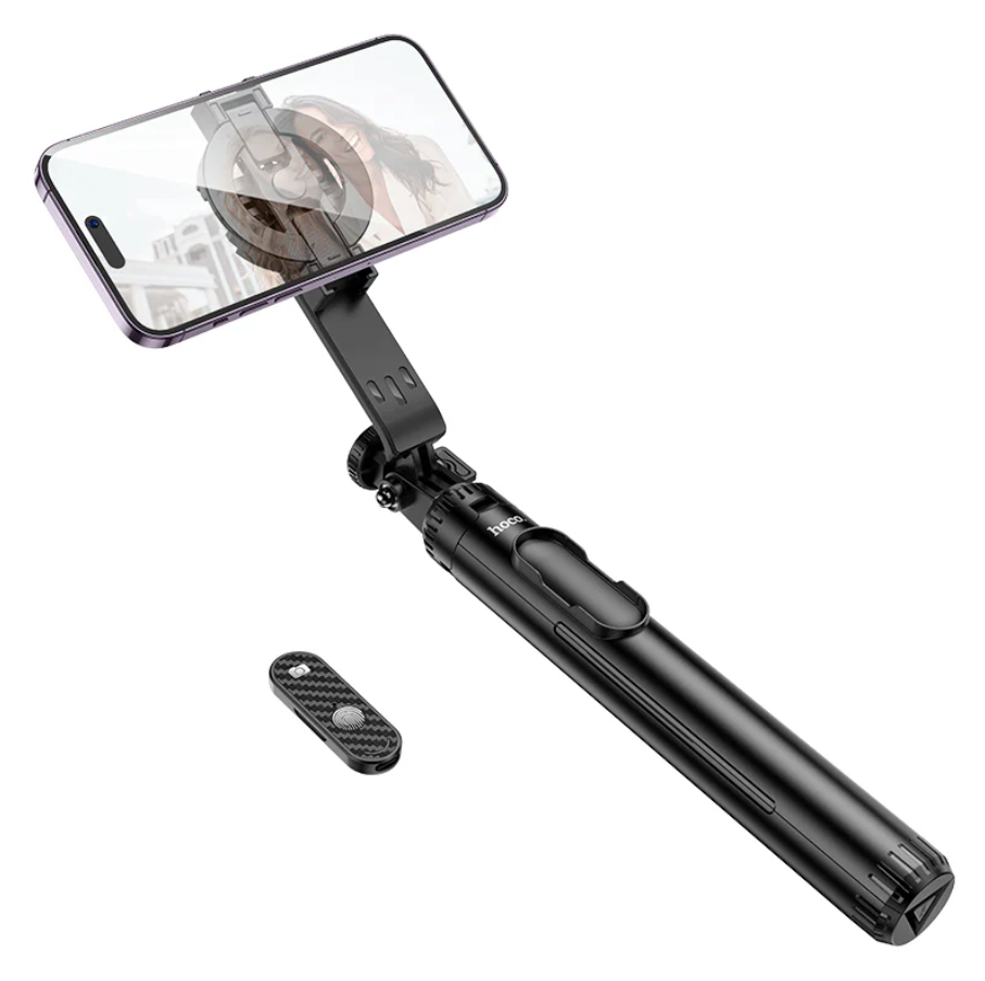 Techplus Hoco Bluetooth selfie stick with 1.5m tripod and magnetic phone holder, shown with smartphone attached for photos.