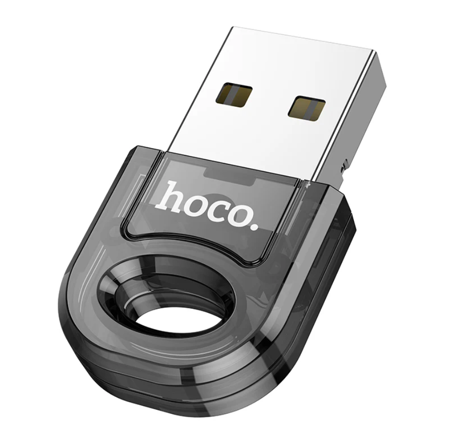 Techplus Hoco USB Bluetooth receiver adaptor wireless dongle plugged into a computer for wireless audio streaming.