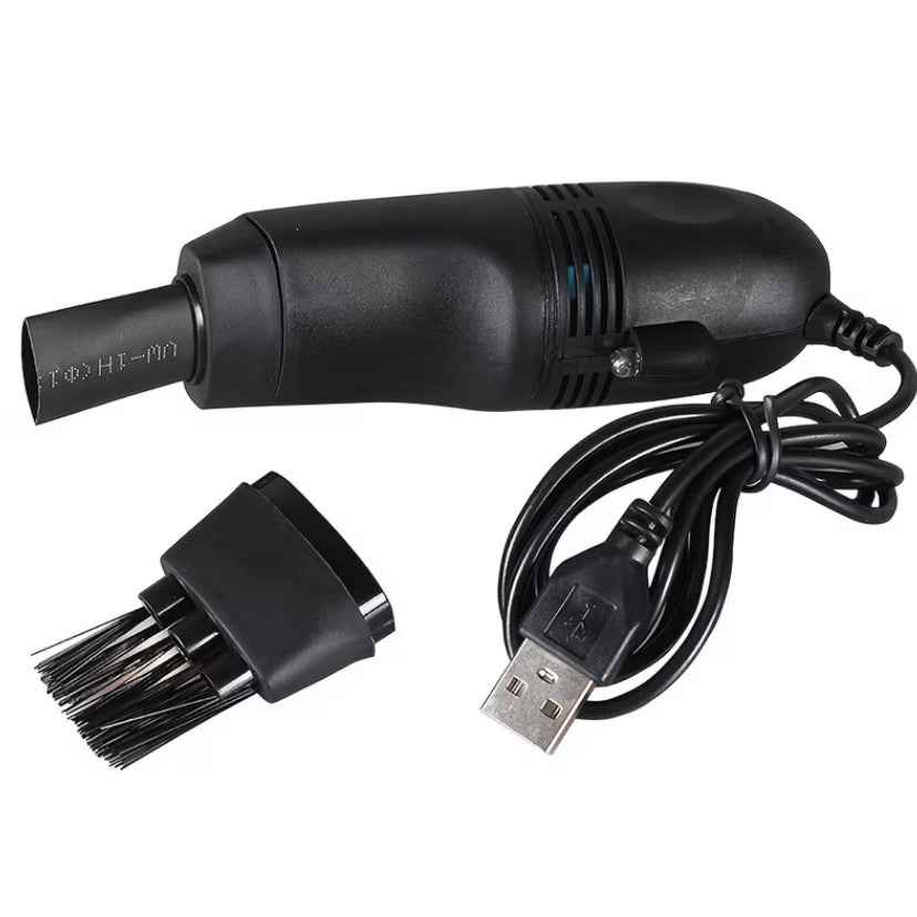 Mini USB office vacuum cleaner by 9eight5 with compact design and cleaning nozzle for removing dust from keyboards and desktops.