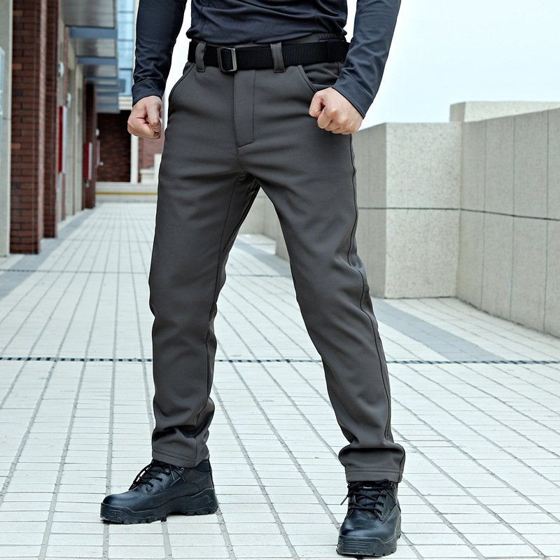 Water-resistant tactical soft shell cargo pants with fleece lining from dealonline.co.nz, featuring multiple pockets and windbreaker material.