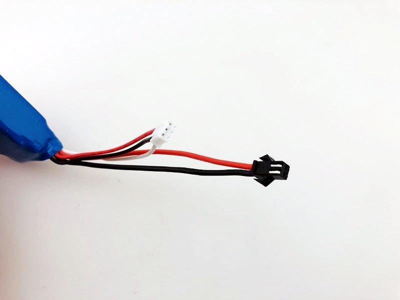 Black 7.4V 1500mAh Li-Po rechargeable drone battery from dealonline.co.nz, compact and lightweight for drone use.