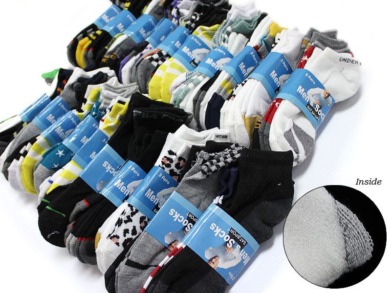 Pair of unisex sport cushion ankle socks in black and white, displayed in a bulk pack, ideal for active wear and sports.