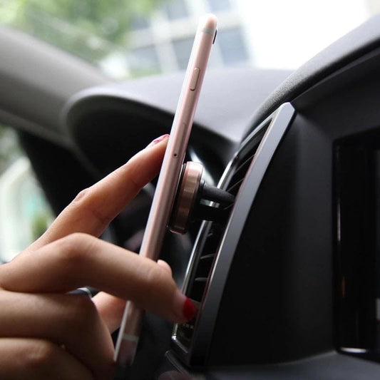 9eight5 magnetic phone holder disk with finger grip for secure phone and tablet attachment, designed for convenience and stability.