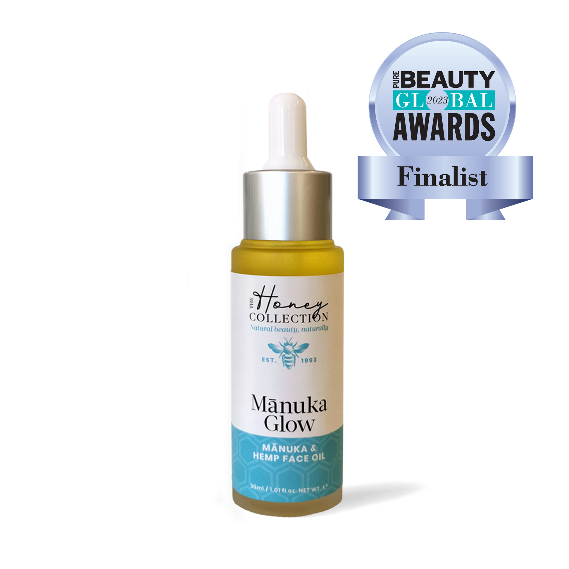 Bottle of Manuka Glow face oil by The Honey Collection, 30ml, with natural ingredients in a clear glass bottle.