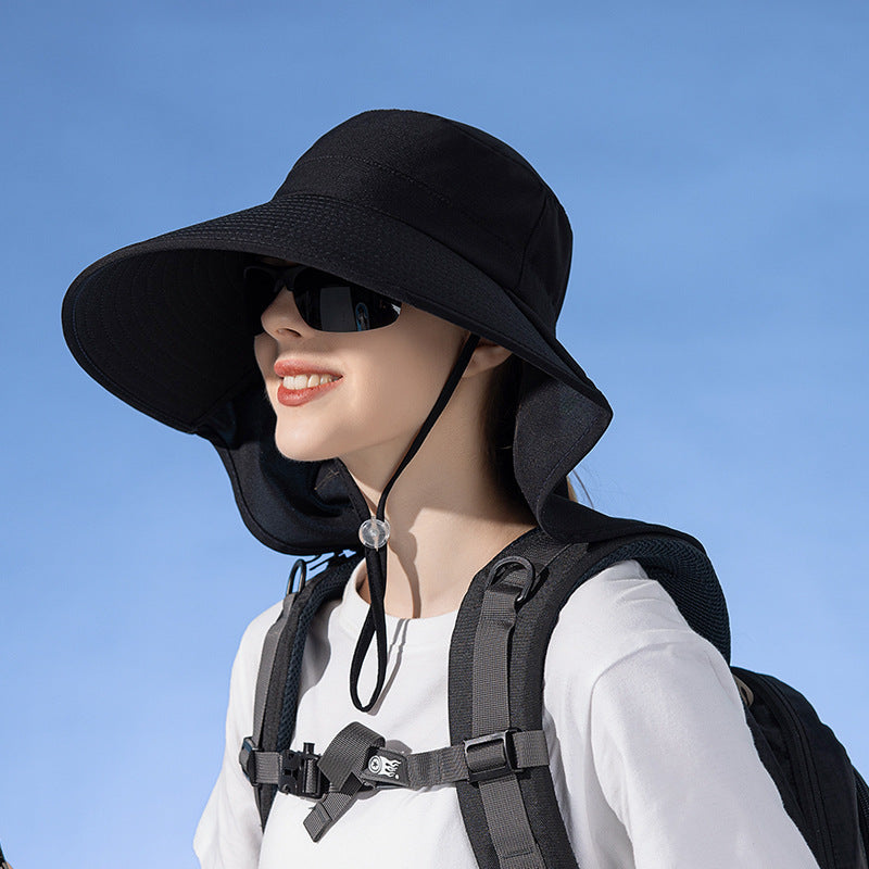 Black wide brim sun hat with UV protection, ideal for outdoor fishing and hiking, featuring a stylish bucket design.