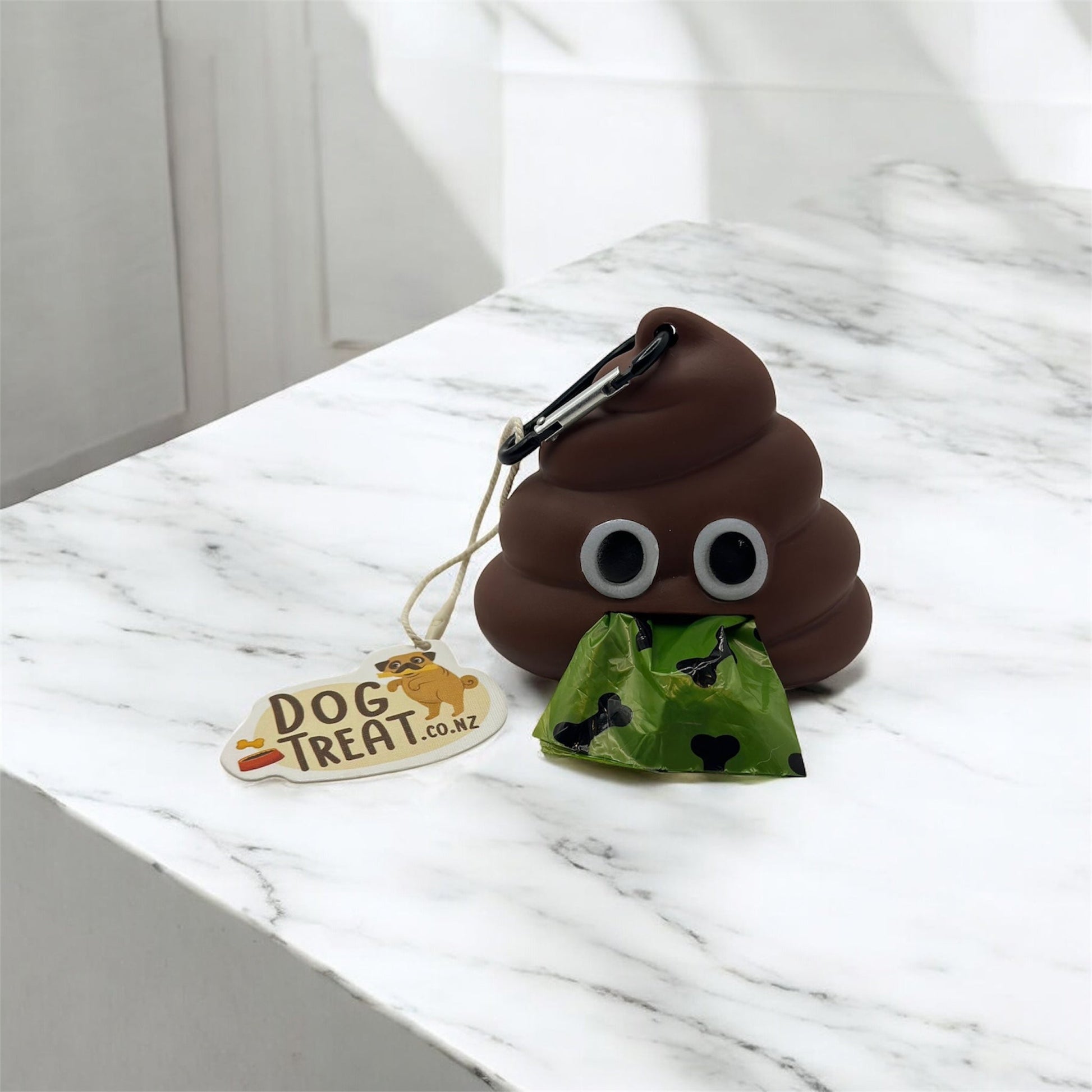 DogTreatNZ emoji poop bag holder featuring a playful poop emoji design, compact and portable for easy dog waste cleanup.