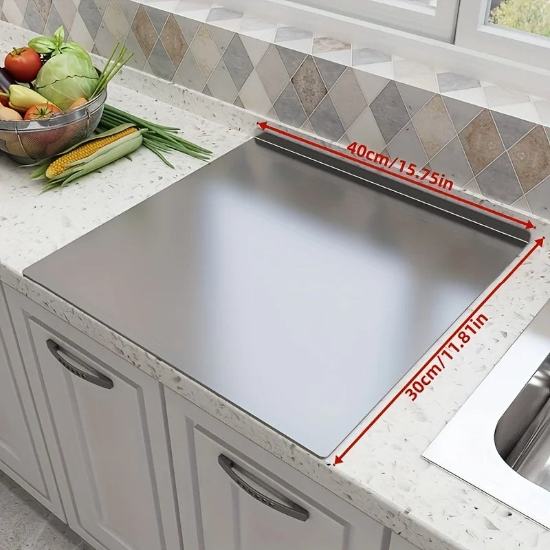 Stainless steel ShopHub NZ chopping board with a smooth, durable surface ideal for food preparation in a modern kitchen.