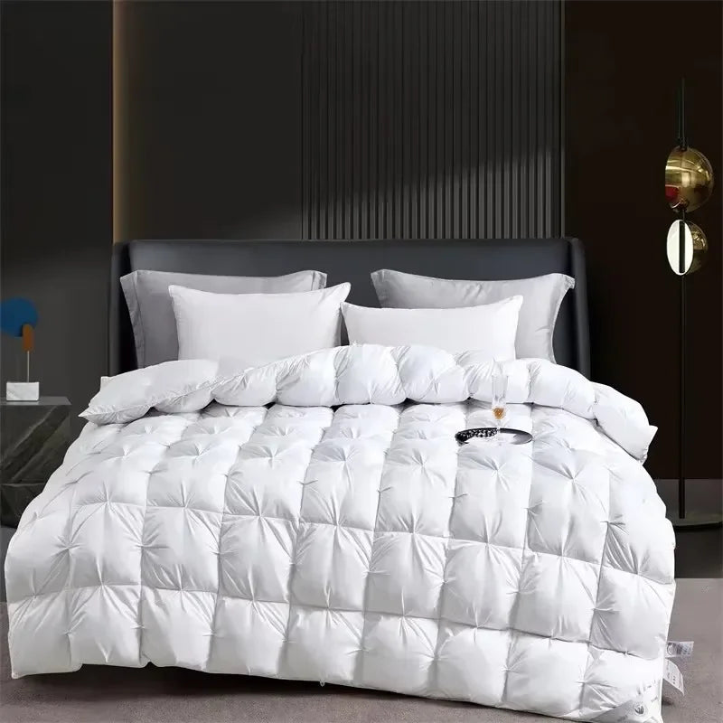 White goose down quilt from ShopHub NZ showcasing a plush, luxurious quilt with a soft, inviting appearance for ultimate comfort and warmth.