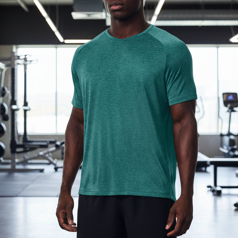 Green quick-drying sports stretch top in 3XL size from dealonline.co.nz, featuring a fitted design and breathable fabric.