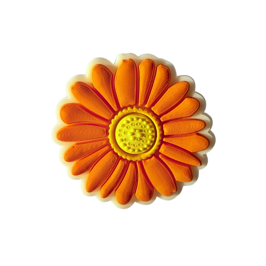 Orange Flower Charm from WALK-itz by Walkieez, featuring a vibrant floral design on a small decorative accessory.