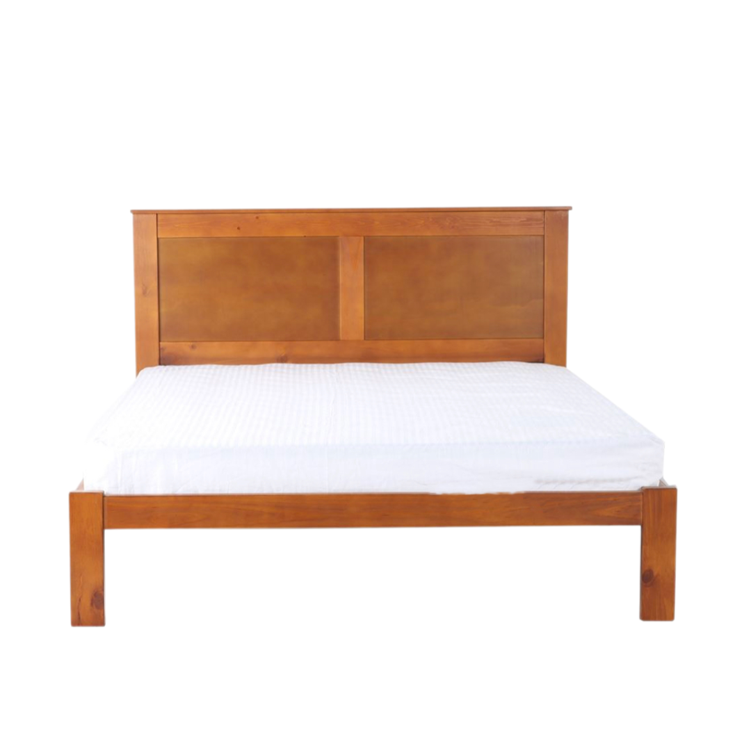 Solid pine "Metro" honey double bed frame by sue-e furniture, showcasing the sturdy wooden bed with a simple, modern design.
