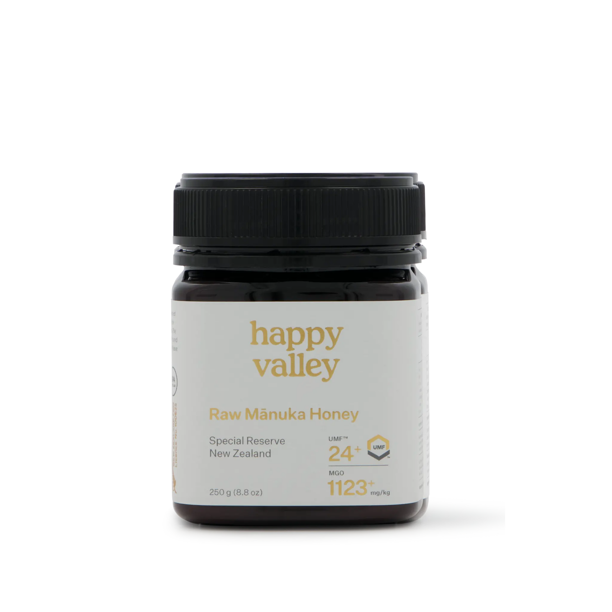 Jar of Happy Valley Honey Mānuka Honey UMF® 24+ with golden color and label, showcasing high-quality Manuka honey in a glass jar
