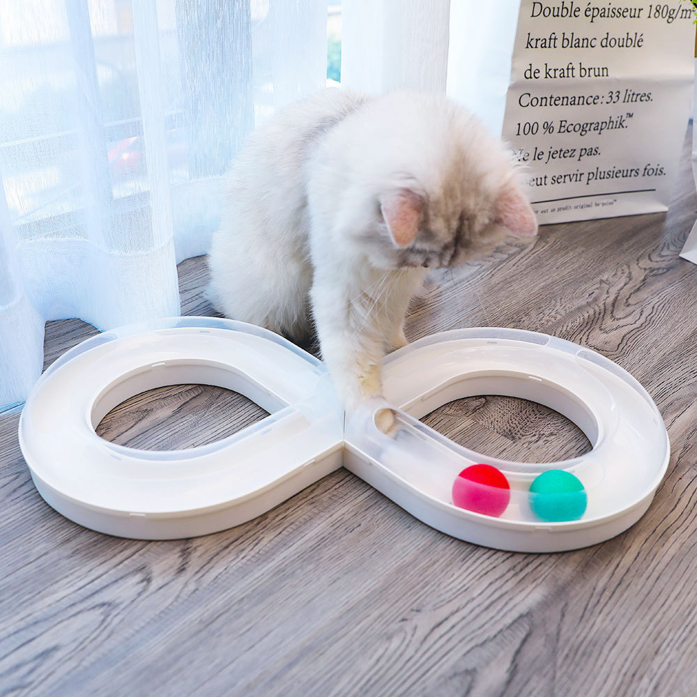 Colorful infinity ball track for cats, featuring interconnected loops and a playful design by dealonline.co.nz