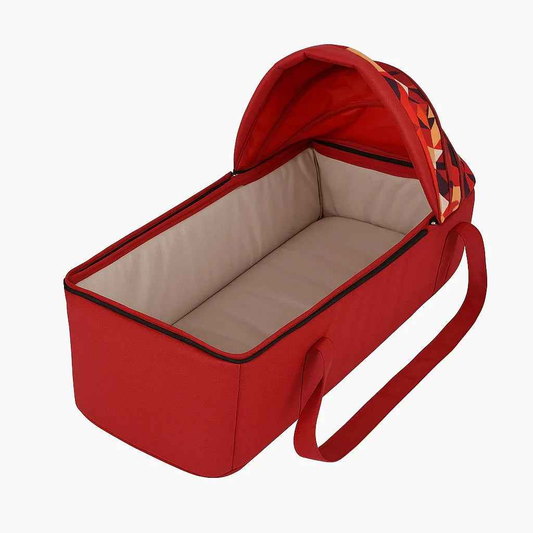 Baby Way NZ Cocoon Soft Carry Cot baby lounger in red with canopy and foot cover, designed as a travel bassinet.