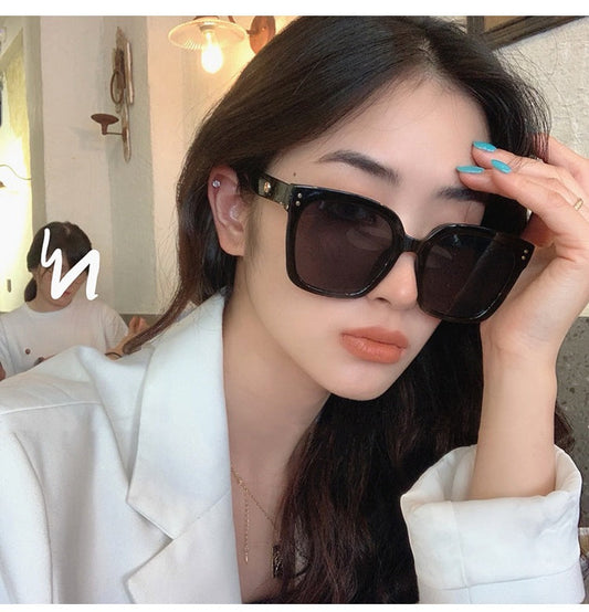ECOTREK polarized square sunglasses for women with UV400 protection, featuring retro fashion brown frames and lenses.