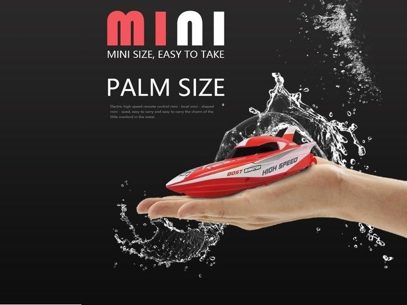 Red remote control racing boat by dealonline.co.nz, sleek design with streamlined hull and control antenna visible in the image.