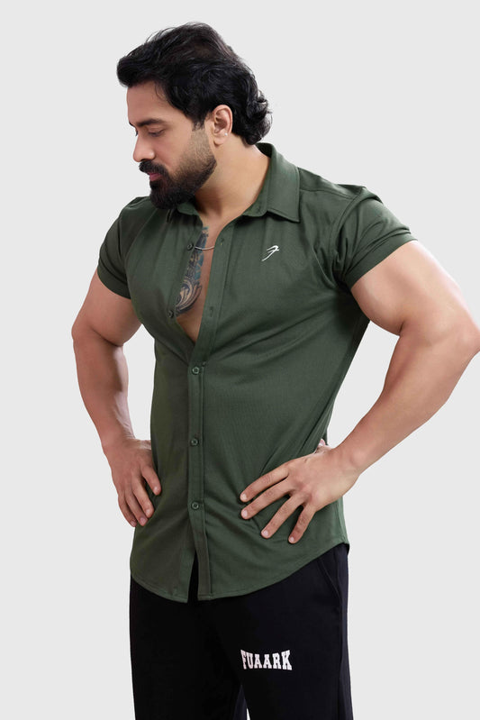 Olive green Aero casual shirt by Fuaark Nz, featuring a relaxed fit and soft fabric, displayed on a hanger.
