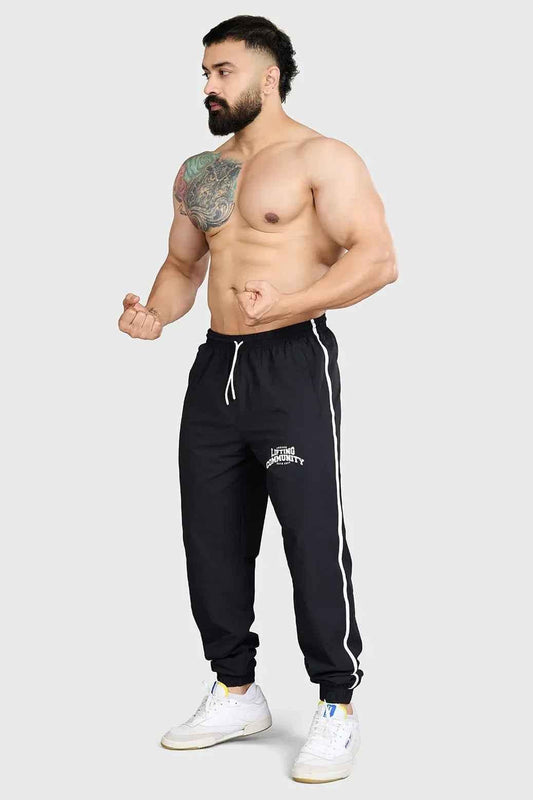 Fuaark Nz black lifting joggers for men, designed for comfortable community workouts, featuring a relaxed fit and soft fabric.