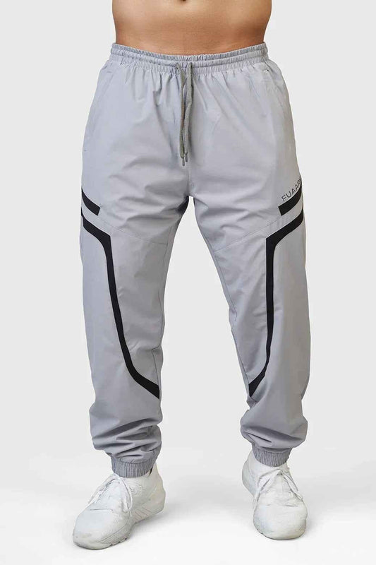 Light grey Fuaark Nz Momentum Joggers shown on a model, featuring a comfortable fit and casual style for active wear.