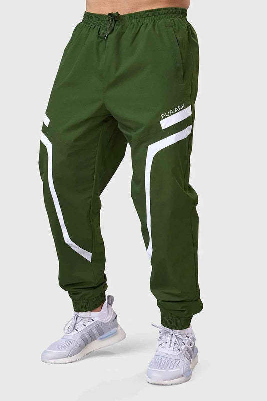 Fuaark Nz Momentum Joggers in olive color, casual athletic pants with a relaxed fit and elastic waistband.