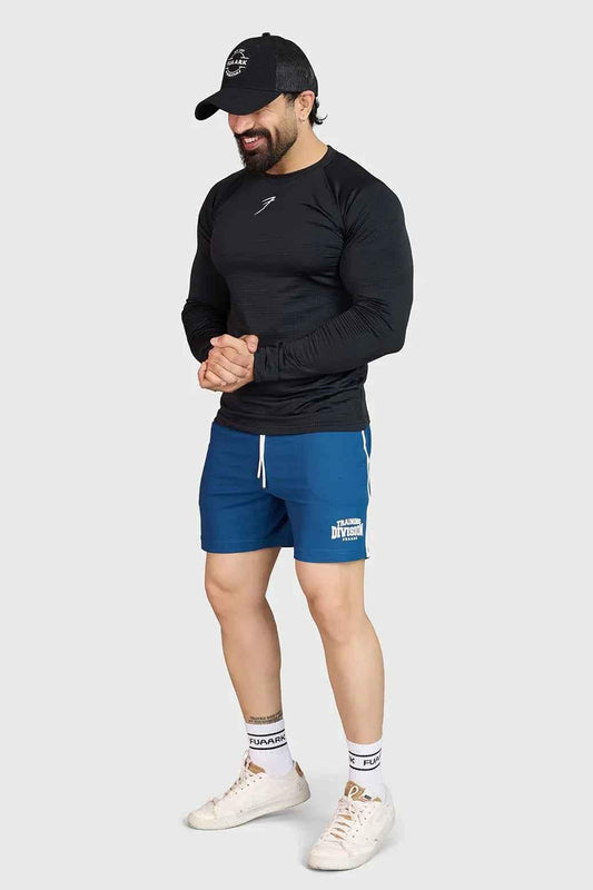 Fuaark NZ Grit Shorts in Orion Blue, men's casual shorts with a relaxed fit and durable fabric, shown on a model.