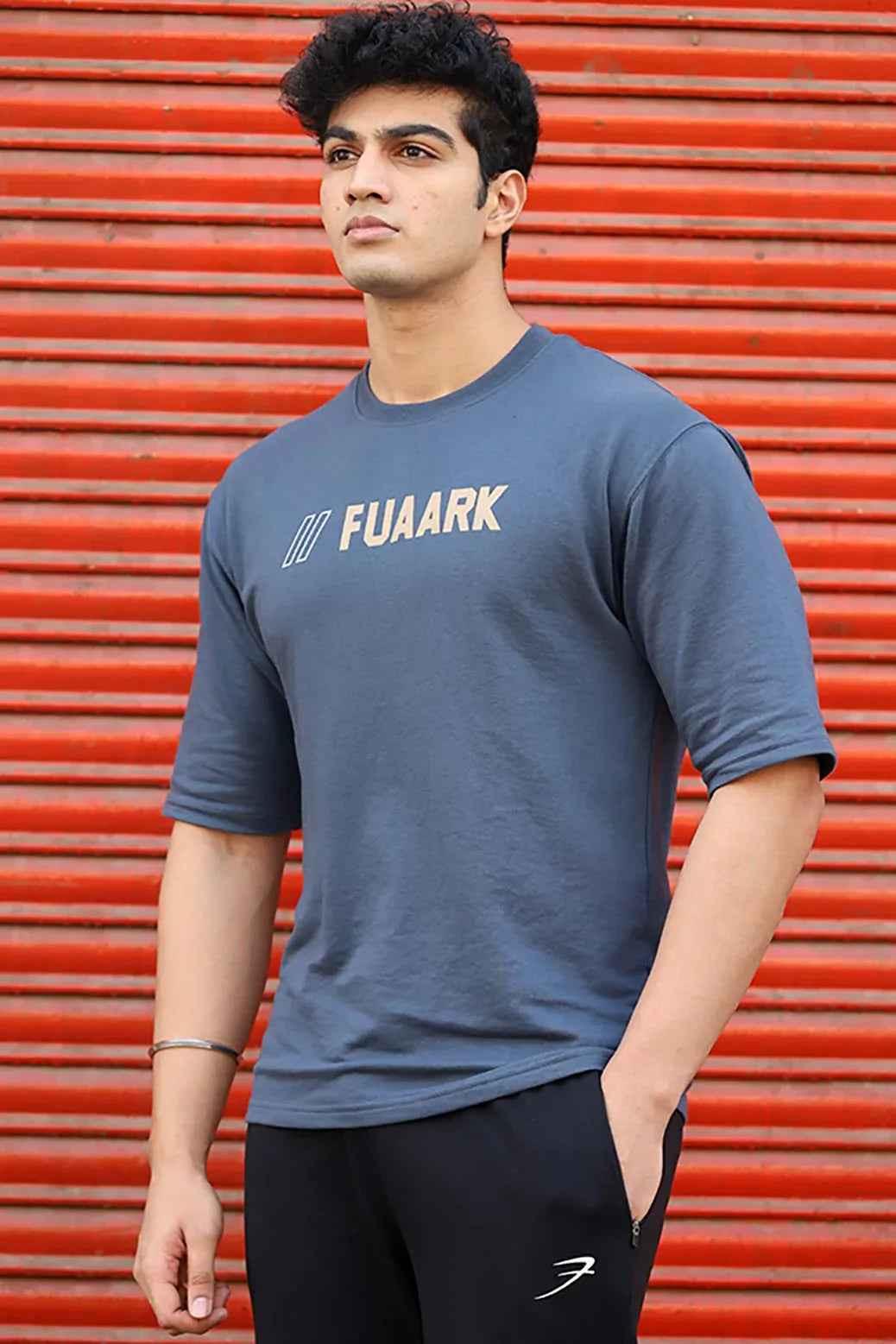 Fuaark Nz Greatest Oversized Grey T-Shirt, casual fit, soft fabric, front graphic design, laid flat for display.