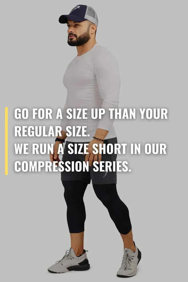 Black high neck compression T-shirt by Fuaark Nz with full sleeves, designed for performance and athletic wear.