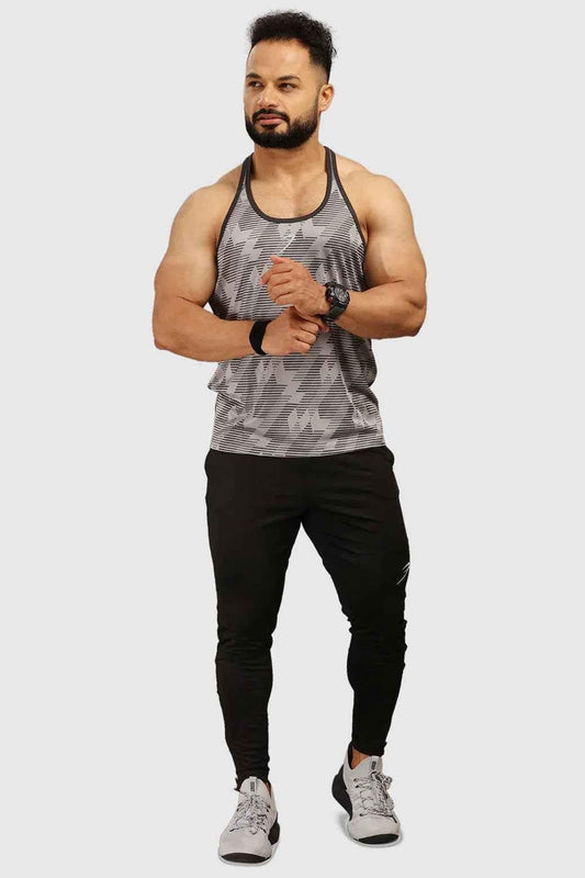 Light grey Amplify Stringer tank top by Fuaark Nz, sleeveless athletic shirt with fitted style and breathable fabric.