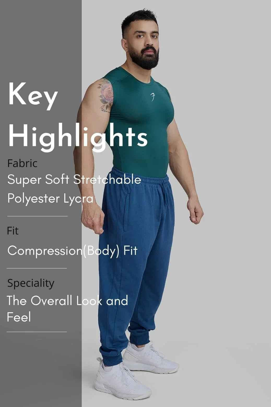 Emerald green compression sleeveless tank top by Fuaark Nz, close-up of fitted athletic tank with smooth fabric and sleeveless design.