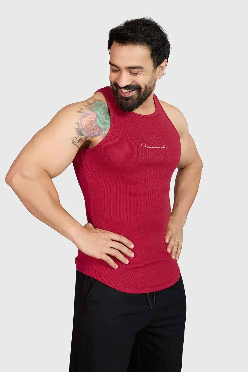 Red ribbed tank top by Fuaark Nz, stylish and comfortable casual wear, front view showing fitted design and soft fabric.