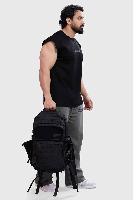 Black Fuaark Nz blackout cap-sleeves tank top displayed on a model, showcasing its fitted design and black color.