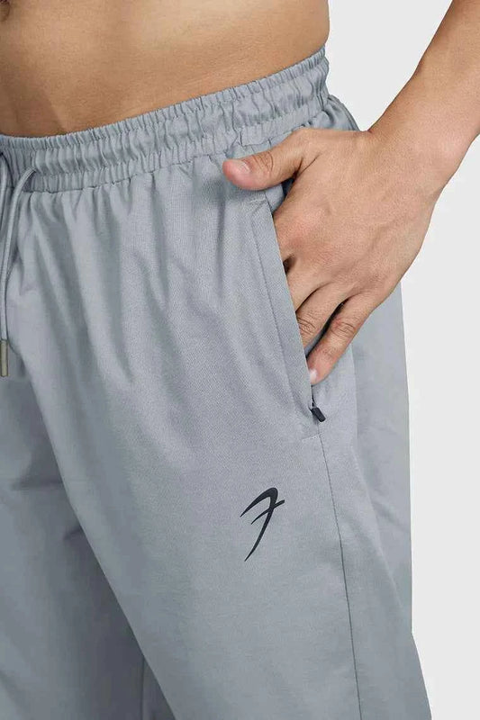Fuaark Nz smart casual light grey track pants with a relaxed fit and elastic waistband, suitable for everyday wear.