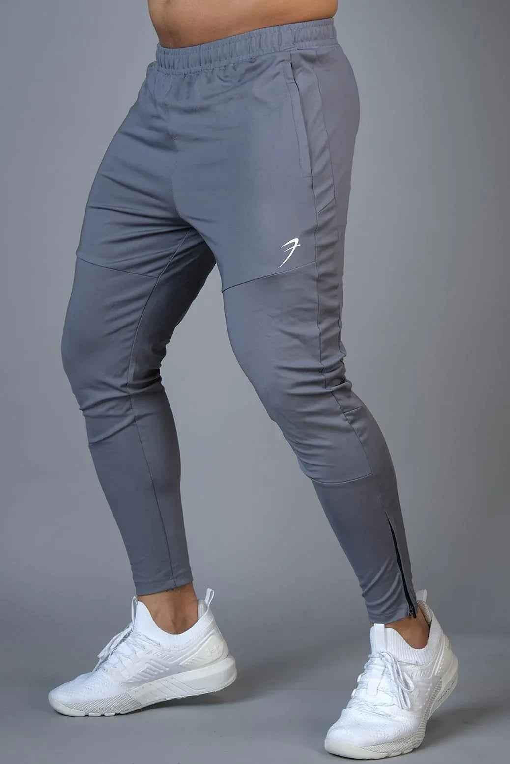 Fuaark Nz Hybrid Slim Tracks for enhanced performance and style, showcasing sleek black athletic track shoes with modern design
