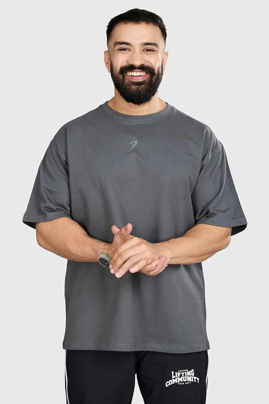 Grey heavyweight oversized T-shirt by Fuaark Nz, designed for maximum comfort, shown in a relaxed fit style.