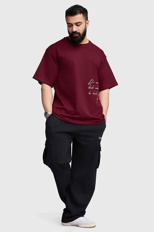 Maroon oversized T-shirt by Fuaark Nz featuring a casual, relaxed fit for effortless style and comfort.