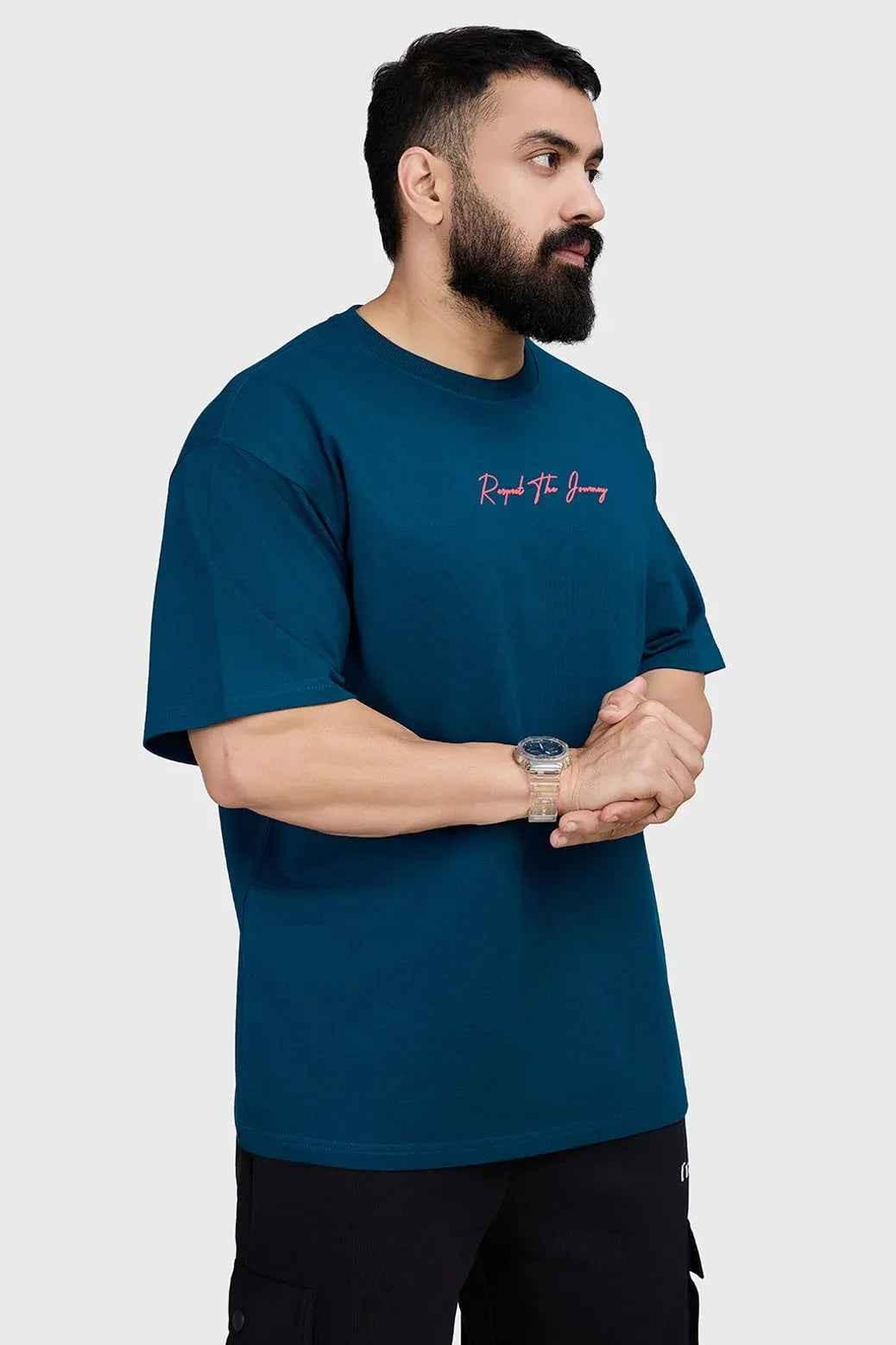 Fuaark Nz oversized teal T-shirt with Respect The Journey graphic, relaxed fit, soft fabric, casual style, front view.