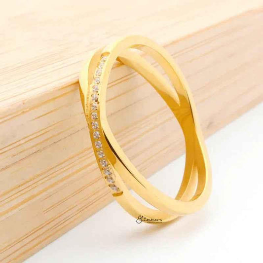 Gold stainless steel criss-cross X ring by Glitters, stylish jewelry with a sleek design, perfect for modern fashion accessories.