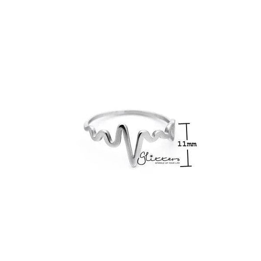 Stainless steel heartbeat and heart women's rings by Glitters, featuring sleek designs and polished finishes.