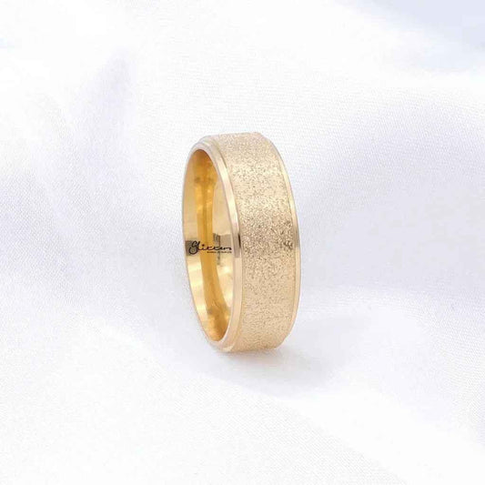 Gold stainless steel band ring with sandblasted finish, 8mm width, by Glitters, showcasing its textured surface and sleek design.