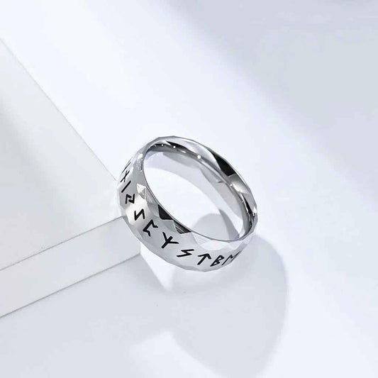 Stainless steel Viking Norse rune ring in silver by Glitters, featuring engraved Norse symbols on a sleek band