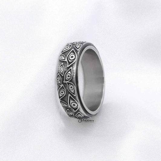 Silver stainless steel Eye of God spinner ring by Glitters featuring detailed design and smooth bands on a white background.