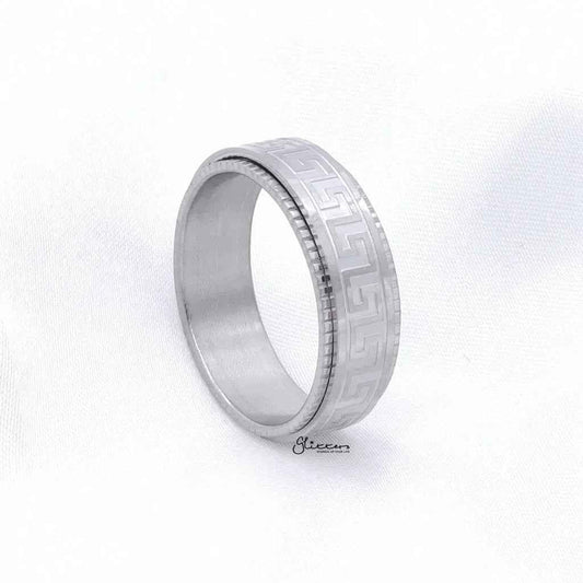 Stainless steel Greek key pattern spinner ring by Glitters, featuring intricate design and smooth spinning surface.
