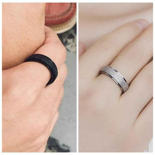 Stainless steel band ring with a sandblasted finish in silver, featuring a sleek, modern design from Glitters.