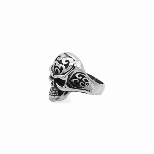 Stainless steel skull ring with tribal carved design from Glitters featuring detailed, edgy craftsmanship for bold style.