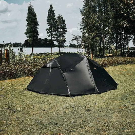 Four season double-layer camping tent by Mead's Supply & Equipment Outfitters, waterproof with aluminum poles, designed for 2-3 persons.