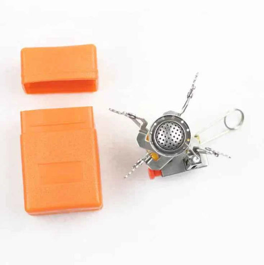 Orange portable mini camping stove by Mead's Supply & Equipment; lightweight aluminum butane burner for outdoor cooking for 1-3 people.